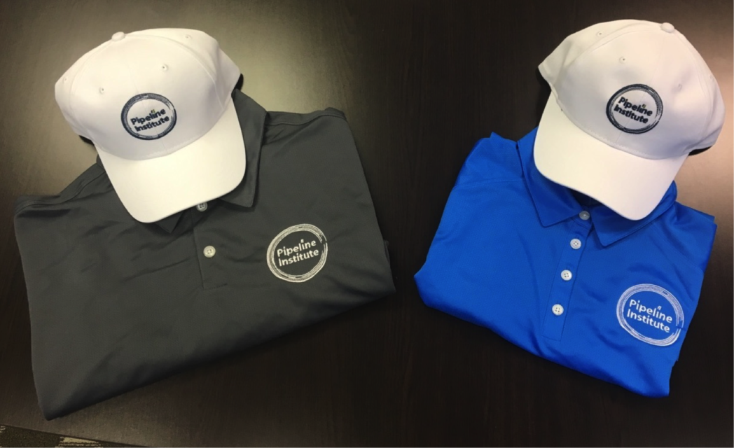 Custom branded caps and Nike shirts to welcome the new trainees.