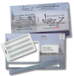 Marketing Mailer Ideas: Mail Card with Built in Luggage Tag and Strap. As low as $1.16 each in bulk order from Brand Spirit Inc.