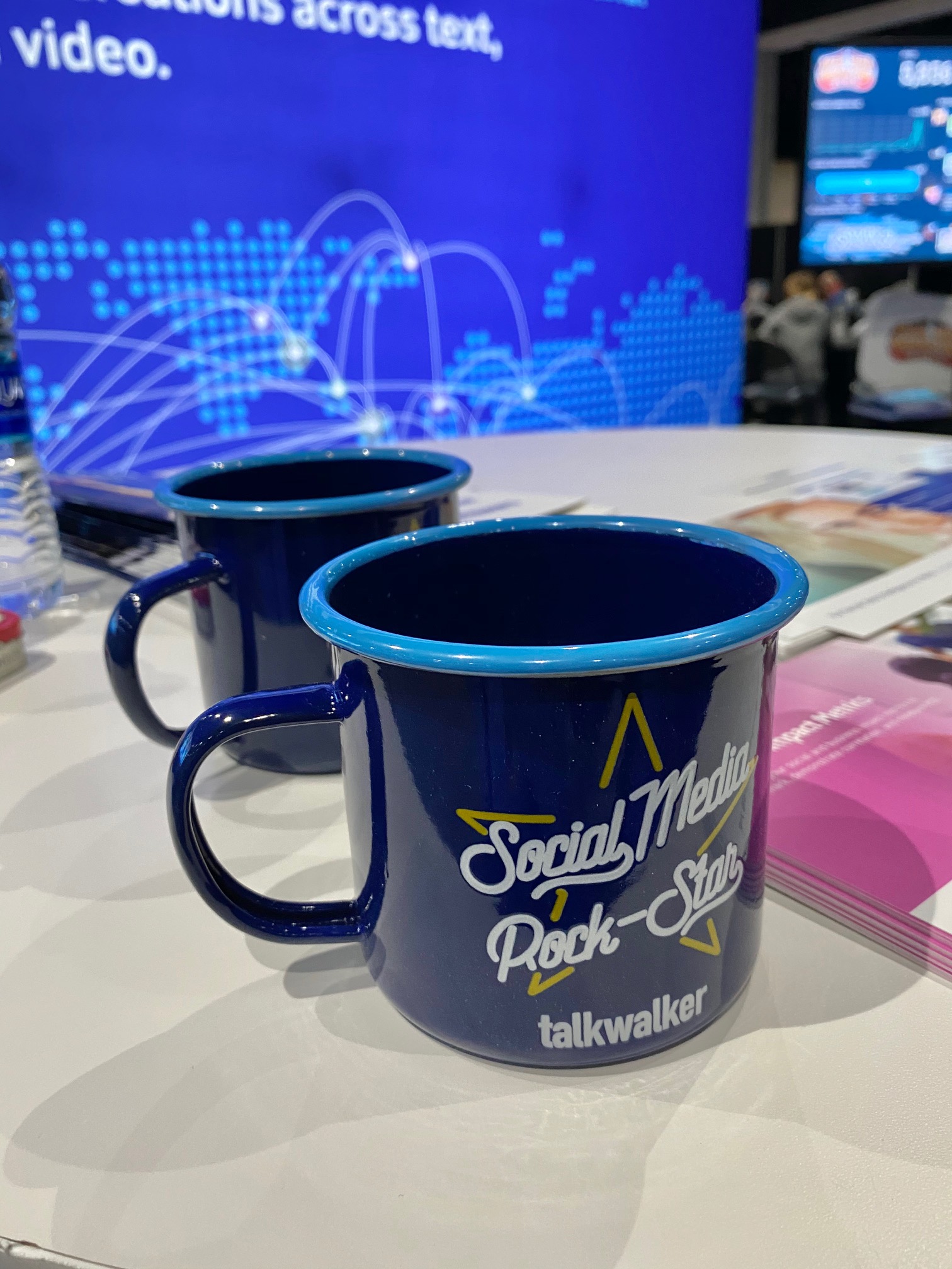 Case History: Promotional Product from Talkwalker. Enamel camp mug with custom message and logo. Ordered from Brand Spirit.
