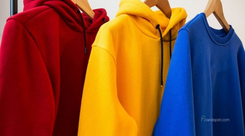 Custom Apparel: hoodie merchandise with logo branding and custom print. Order in bulk from Brand Spirit.