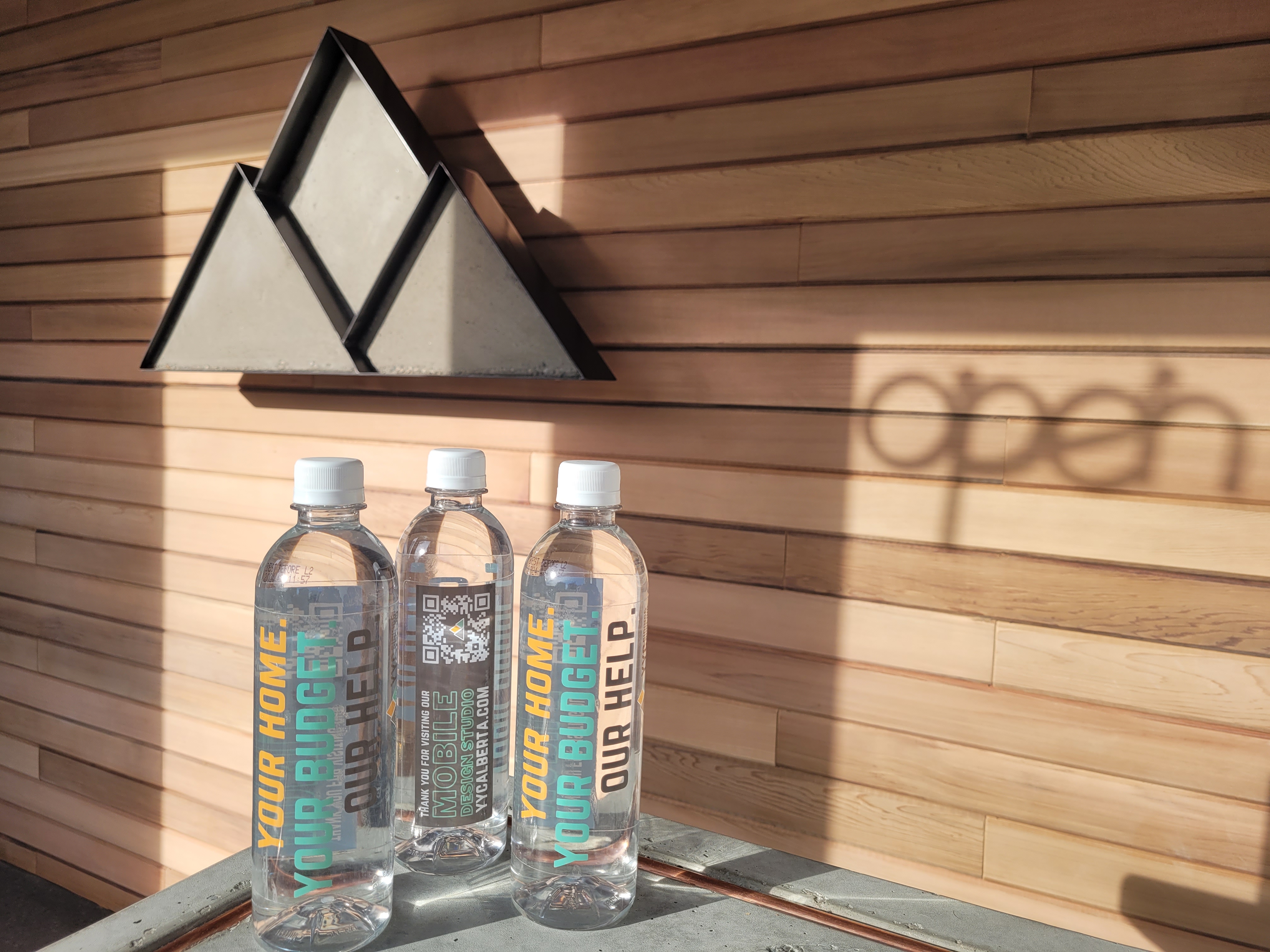 Branded Bottled Water by YYC Sliding and Roofing - Brand 16.9 oz bottled water with the option of purified or spring water. Brand the label with your logo and graphics. Available at brandspirit.