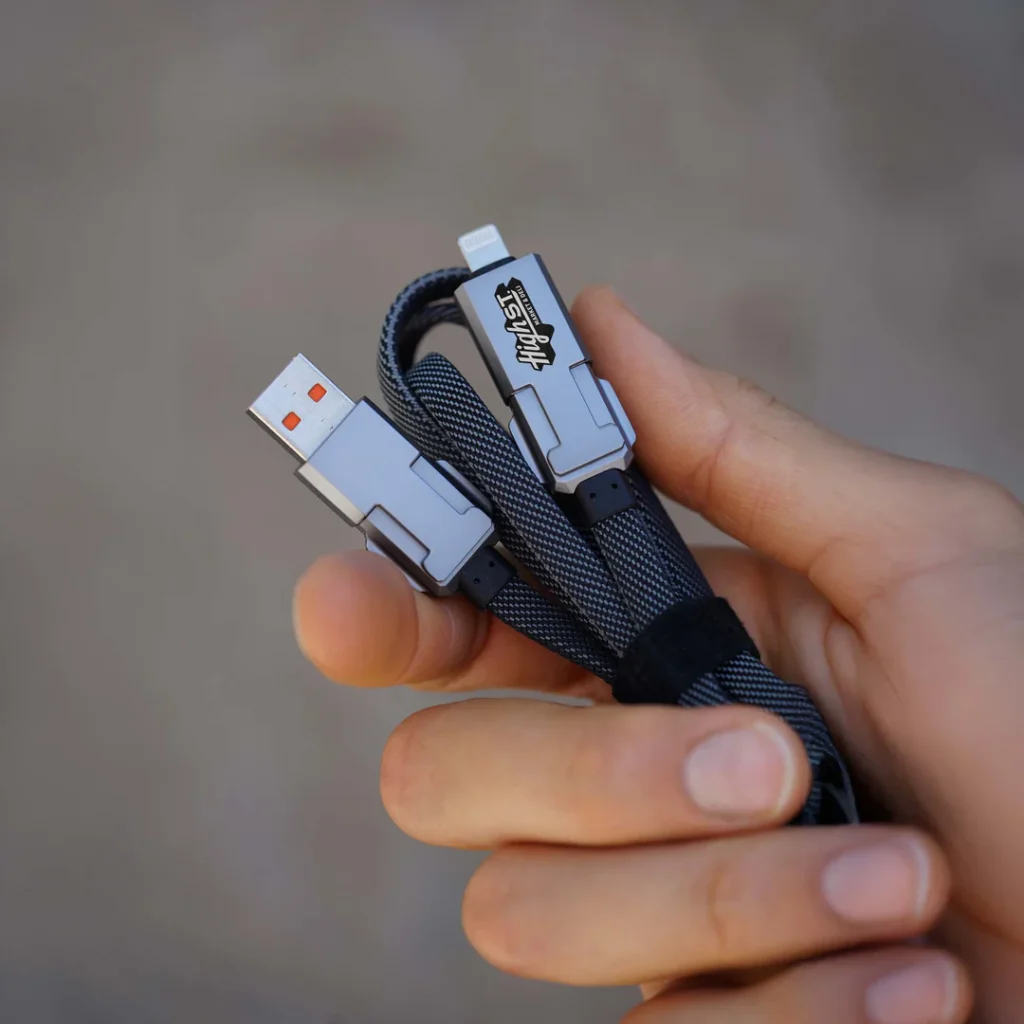 Unique Promotional Gift - Snapcord Charging Cord. The SnapCord's high-quality, interchangeable tips switch out faster than you can blink. It comes with a USB-A to USB-C tip and a Lightning to USB-C tip, making it the ultimate cord to keep your devices charged and running at full speed.