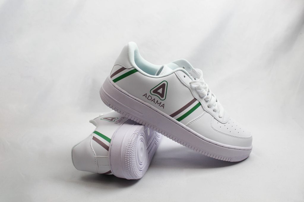 Custom sneakers with logo imprint and full color personalization that looks like K-Swiss
