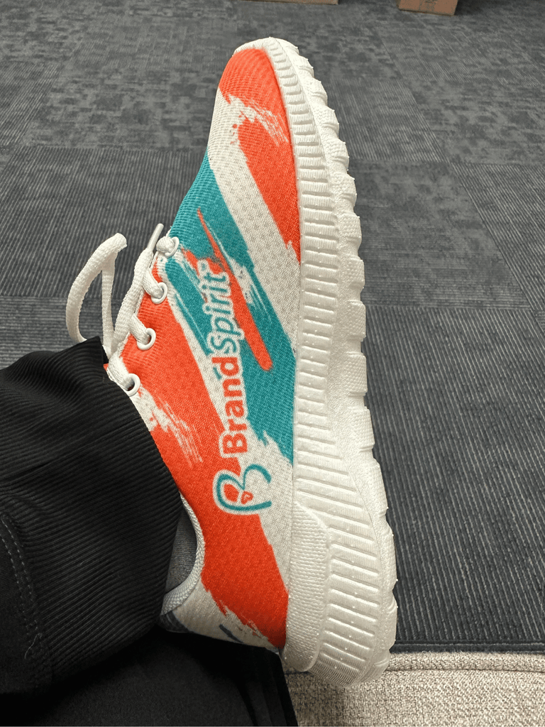 Marketing strategy - custom sneakers with logo and full-custom design including brand colors.